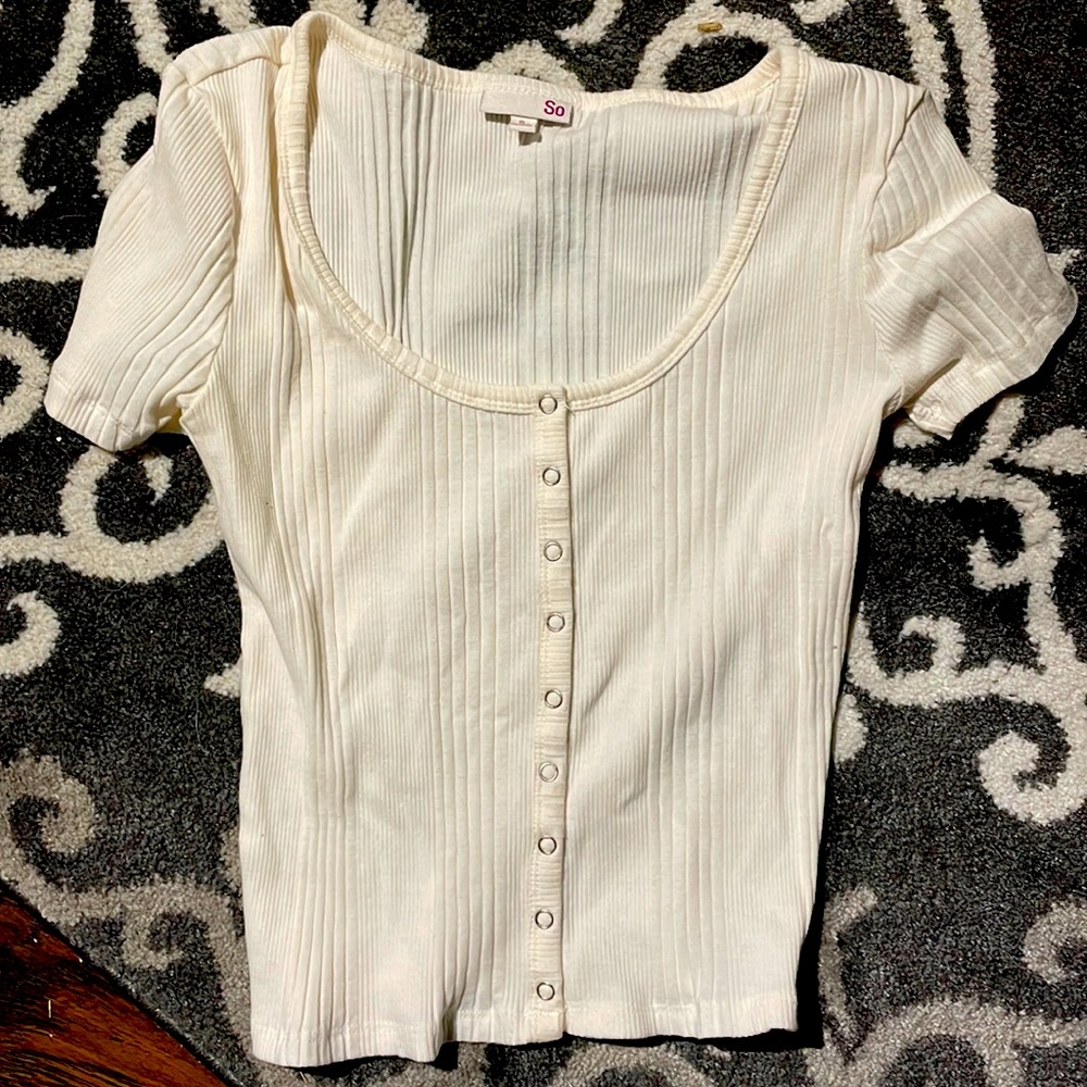 SO cream colored top with buttons going down the front, full length top